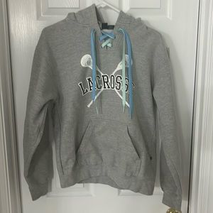 Hoodie Grey Lacrosse with fun blue  laces. Size medium